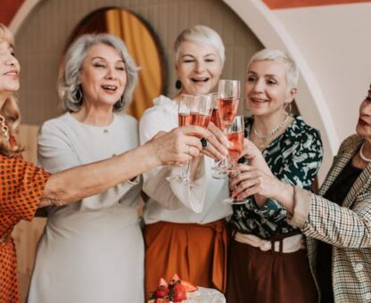 legacy planning, image of senior women raising a toast